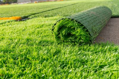 Cover an Area of Ground with Grass or Artificial Turf