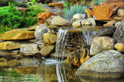 Add Tranquility and Relaxation to Your Outdoor Space with a Pond Installation!